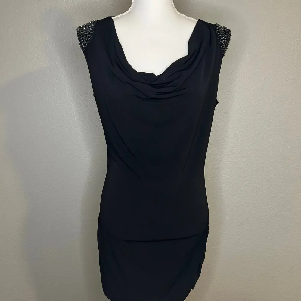 Cache black stretchy mini dress with metal ring accents size M